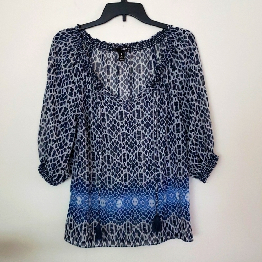 Aqua blouse diamond abstract print, tassels, puff sleeve, semi sheer size small.